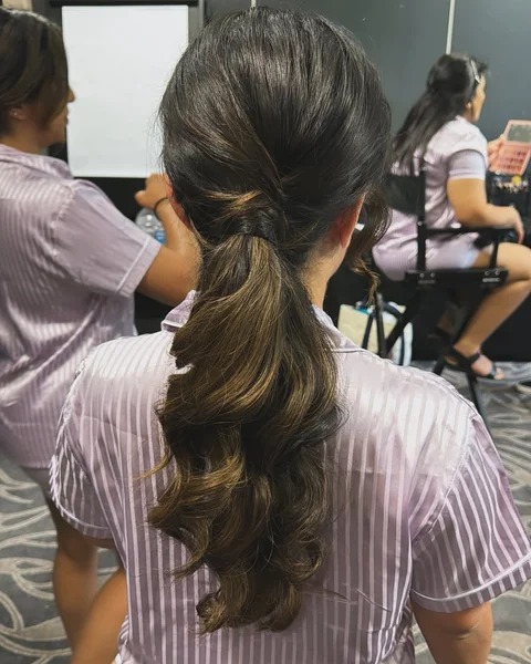 Medium Brown Ponytail with Elegant Pin Curl End