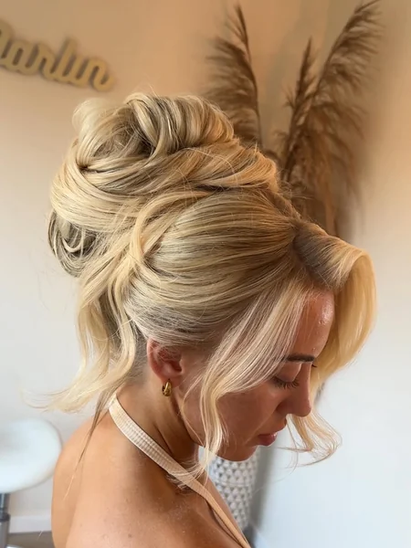 Modern Viking Goddess: Braided Elegance with Soft Curls