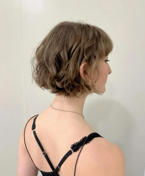Piecey Brunette Layered Bob with Wispy Bangs