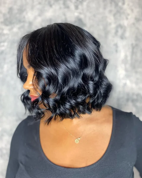 Polished Center-Part Dark Bob with Soft Ends