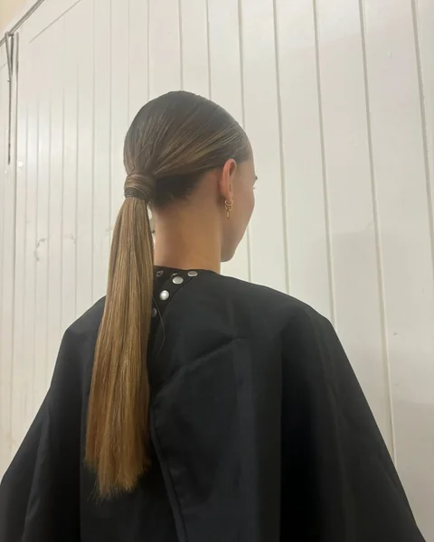 Polished Low Slick Back with Straight Blonde Highlights