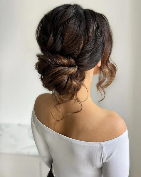 Polished Midnight Chignon with Dense Braided Detail