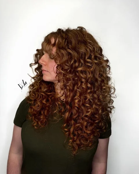 Radiant Copper Ringlets with Soft Curly Fringe