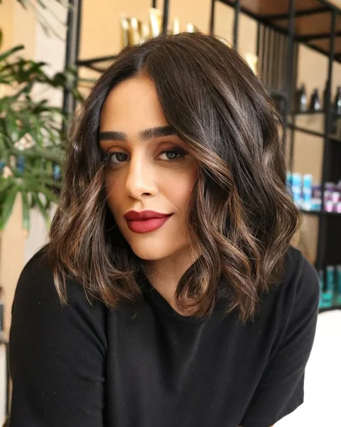 Radiant Face-Framing Mahogany Bob with Sweeping Layers