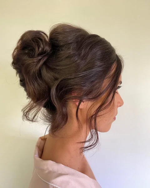 Relaxed Messy Bun with Soft Wavy Layers