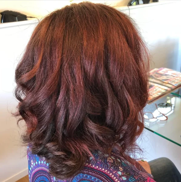 Rich Mahogany Shaggy Bob with Voluminous Flicked Ends