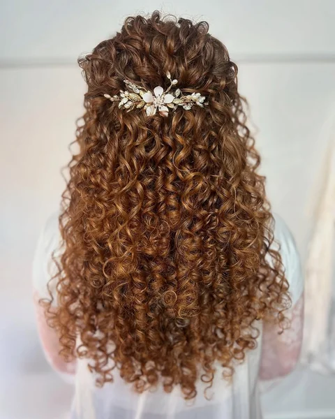 Romantic Auburn Ringlets with Floral Bridal Accent