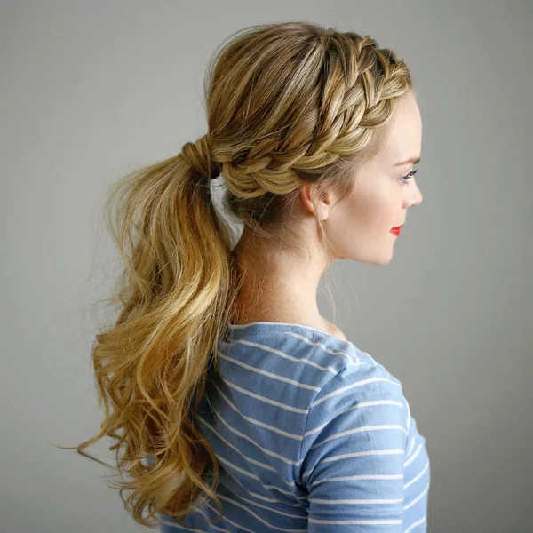 Romantic Braided Ponytail with Soft Waves