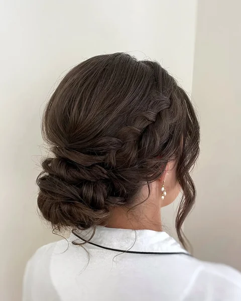 Romantic Low Chignon with Soft Overlapping Twists