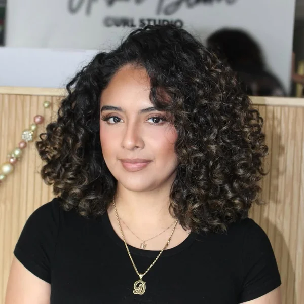 Rounded Brunette Bob with High-Definition Curls