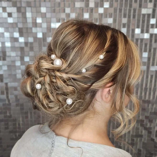 Sculpted Rose Bun with Intricate Woven Texture