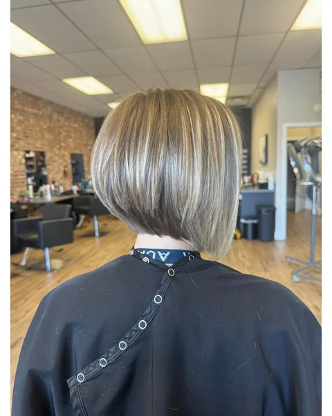 Sharp Ash Blonde Inverted Bob with Stacked Graduation