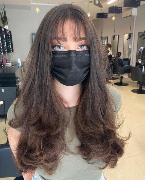 Silky Brunette Waves with Airy Wispy Bangs