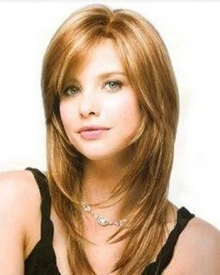 Sleek Caramel Layered Cut with Face-Framing Bangs