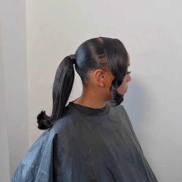 Sleek High Ponytail with Smooth Side Swoop Bang