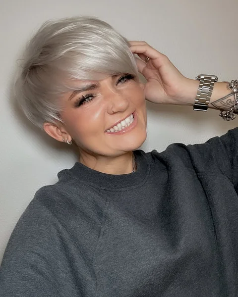 Sleek Arctic White Pixie with Deep Sweeping Fringe