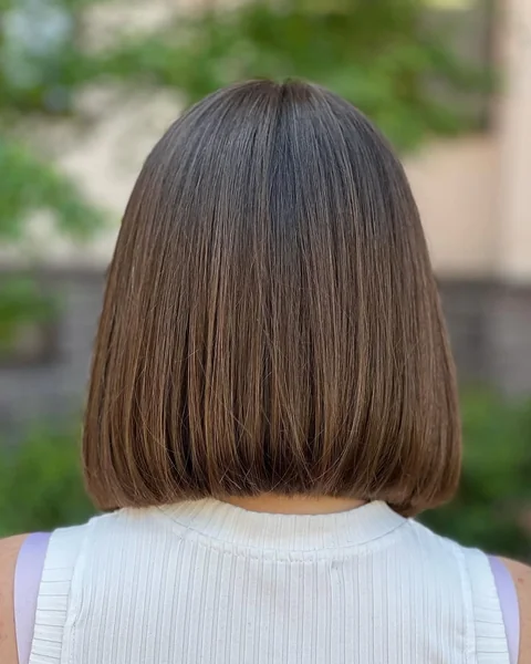 Sleek Brunette Undercut Bob with Subtle Interior Tapering