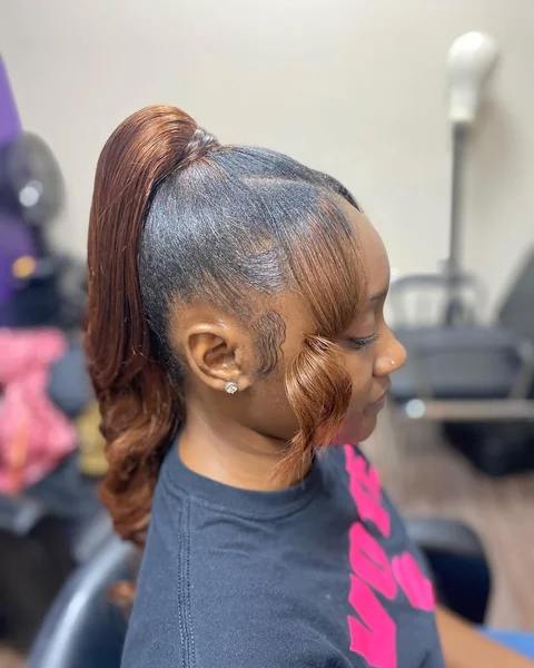 sleek ponytail with bangs