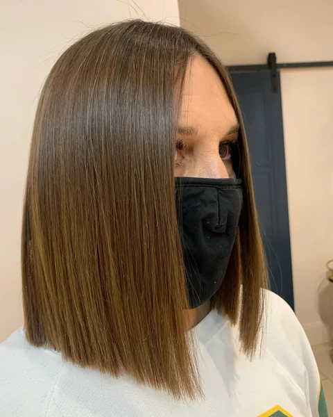 Sleek Glass-Like Blunt Brown Bob