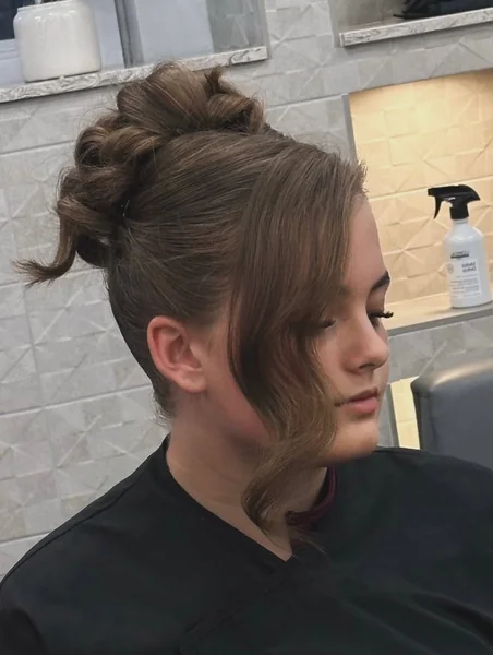 Sleek High Ponytail for Cozy Sweater Looks