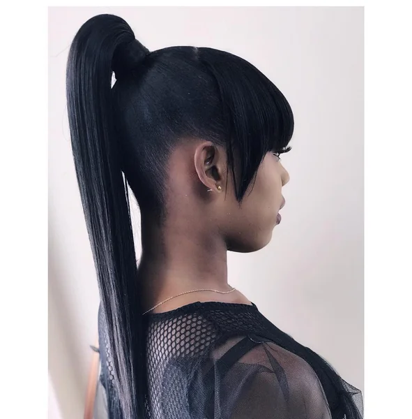 Sleek High Ponytail with Sharp Side-Swept Bangs