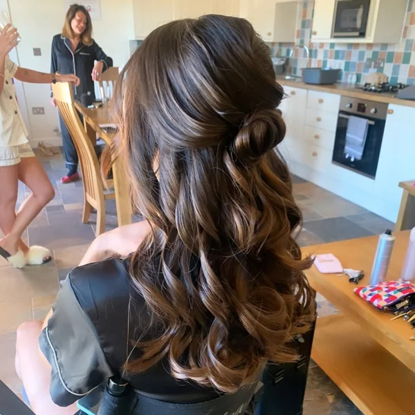 Sleek High Top Knot with Polished Straight Ends