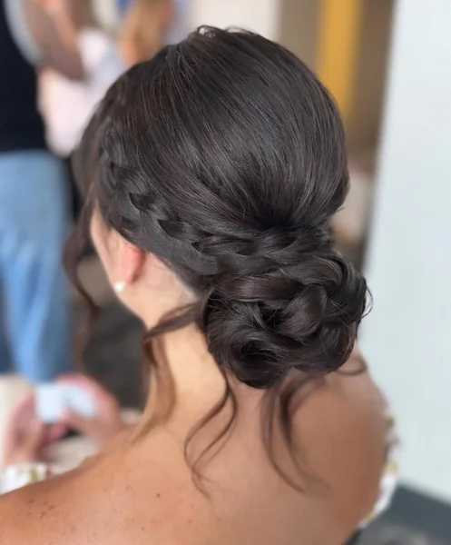 Sleek Side-Braid Chignon for Brunettes