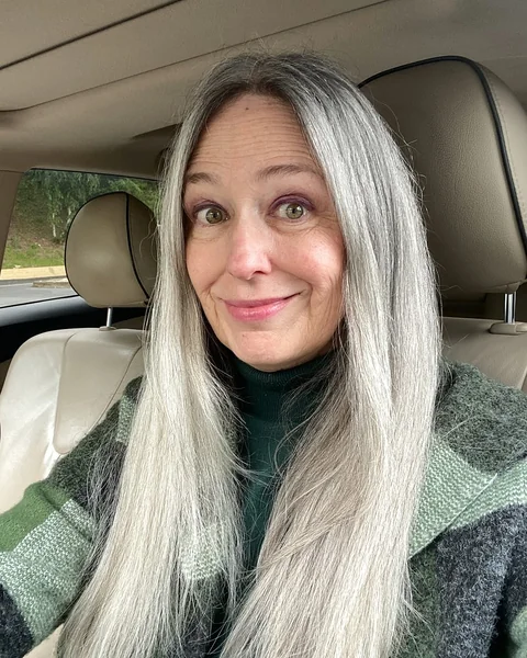 Sleek Silver Tresses: Long and Radiant Natural Style