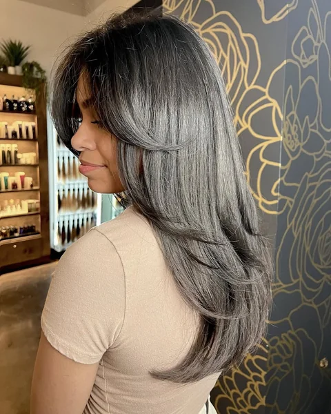 Sleek Smokey Grey Layers with Feathered Face-Framing