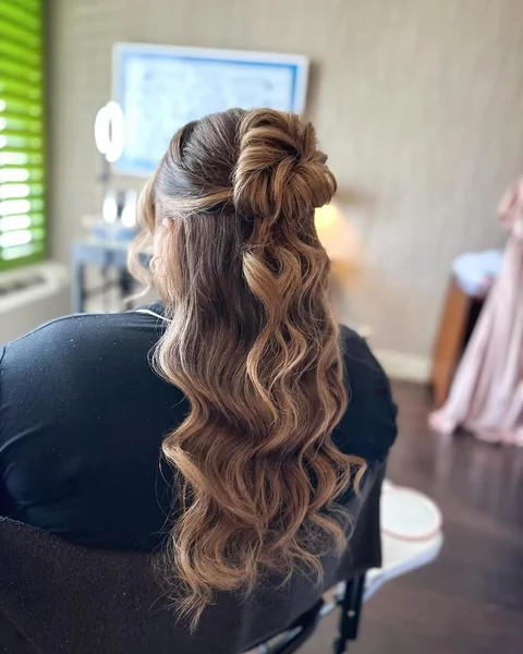 Sleek Twisted Crown with Polished Caramel Waves