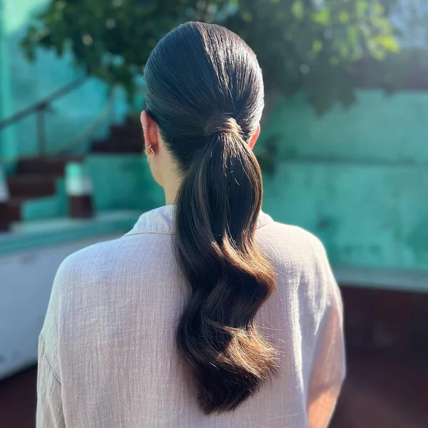 Slick Low Ponytail with Polished S-Wave Ends