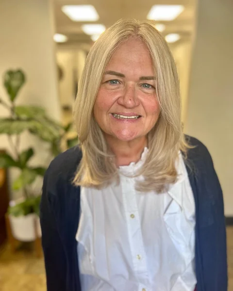 Soft Blonde Long Layers for Subtle Butterfly Shape