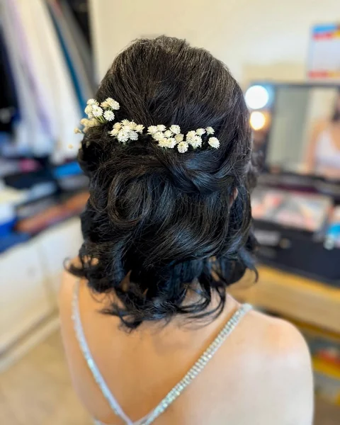 Soft Wavy Updo with Baby’s Breath for Prom