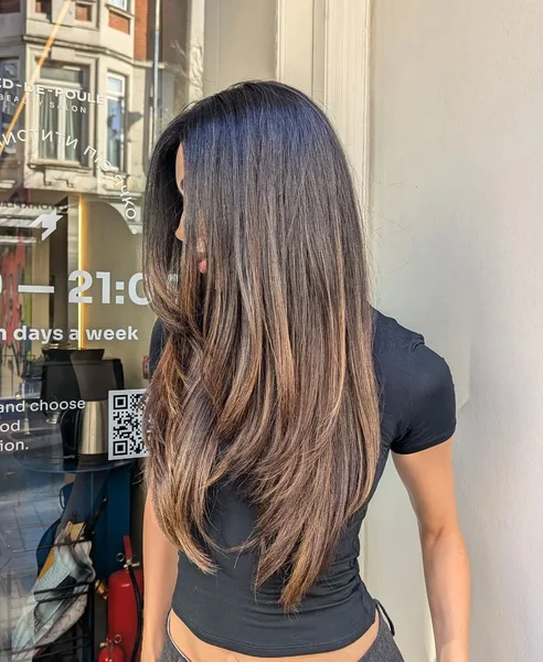 Soft Ash Blonde Shag with Wispy Eye-Skimming Bangs