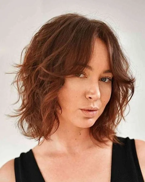 Soft Auburn Shag with Effortless Tousled Curls