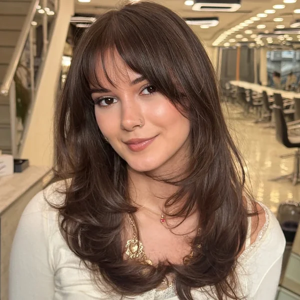 Soft Brunette Shag with Wispy Bottleneck Bangs