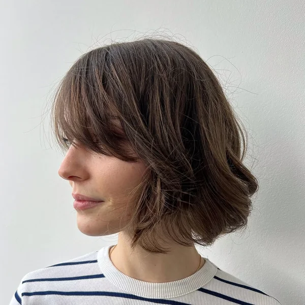 Soft Brunette Wavy Bob with Side-Swept Bangs