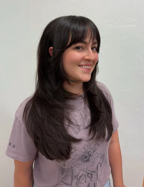 Soft Sun-Kissed Layers with Wispy Eyelash Bangs