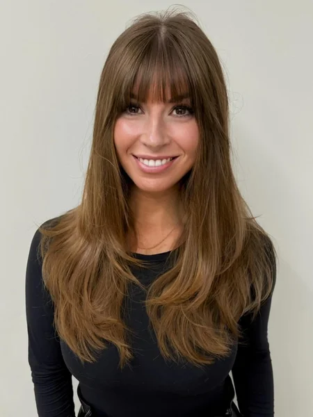 Sophisticated Mocha Layers with Feathered Curtain Bangs