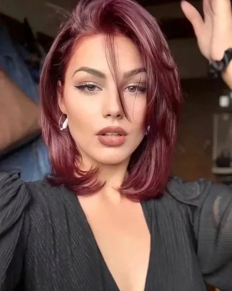 Sultry Plum Layered Bob with Wispy Peek-a-Boo Bangs