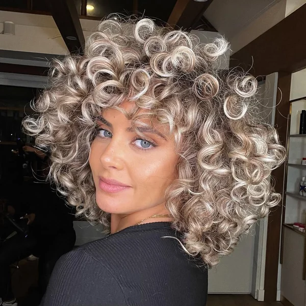 Sun-Drenched Honey Brown Curly Bob