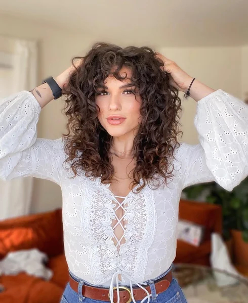 Tapered Chocolate Ringlets with Airy Curly Bangs