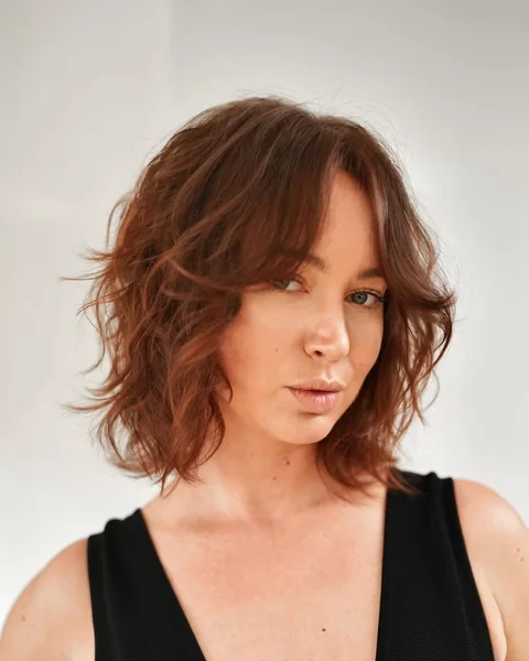 Textured Mahogany Shag Bob with Face-Framing Layers