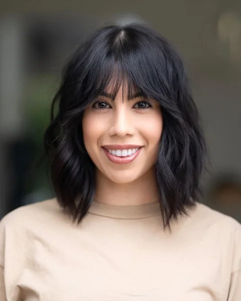 Textured Raven Shag with Wispy Pointed Bangs