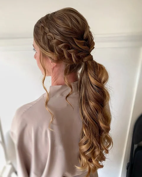Textured Wavy Blonde Formal Low Ponytail