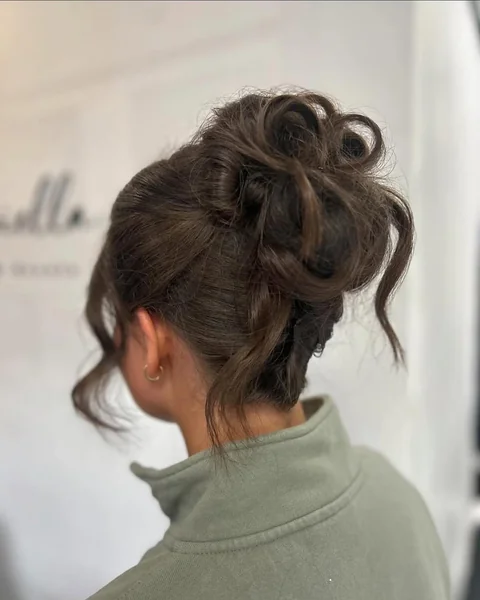 Twisted Brunette High Bun with Airy Texture