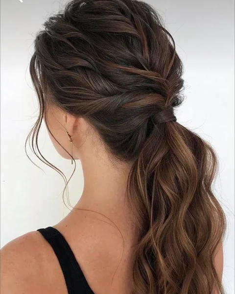 Twisted Low Ponytail with Soft Brunette Waves