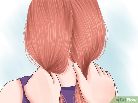 Step 1 Divide your hair into two sections.