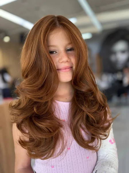 Voluminous Copper Butterfly Layers for Long Hair