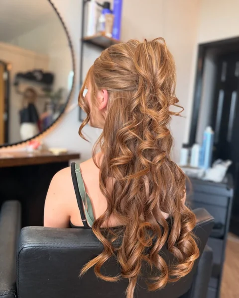 Voluminous Copper Half-Up Ponytail with Spiral Curls